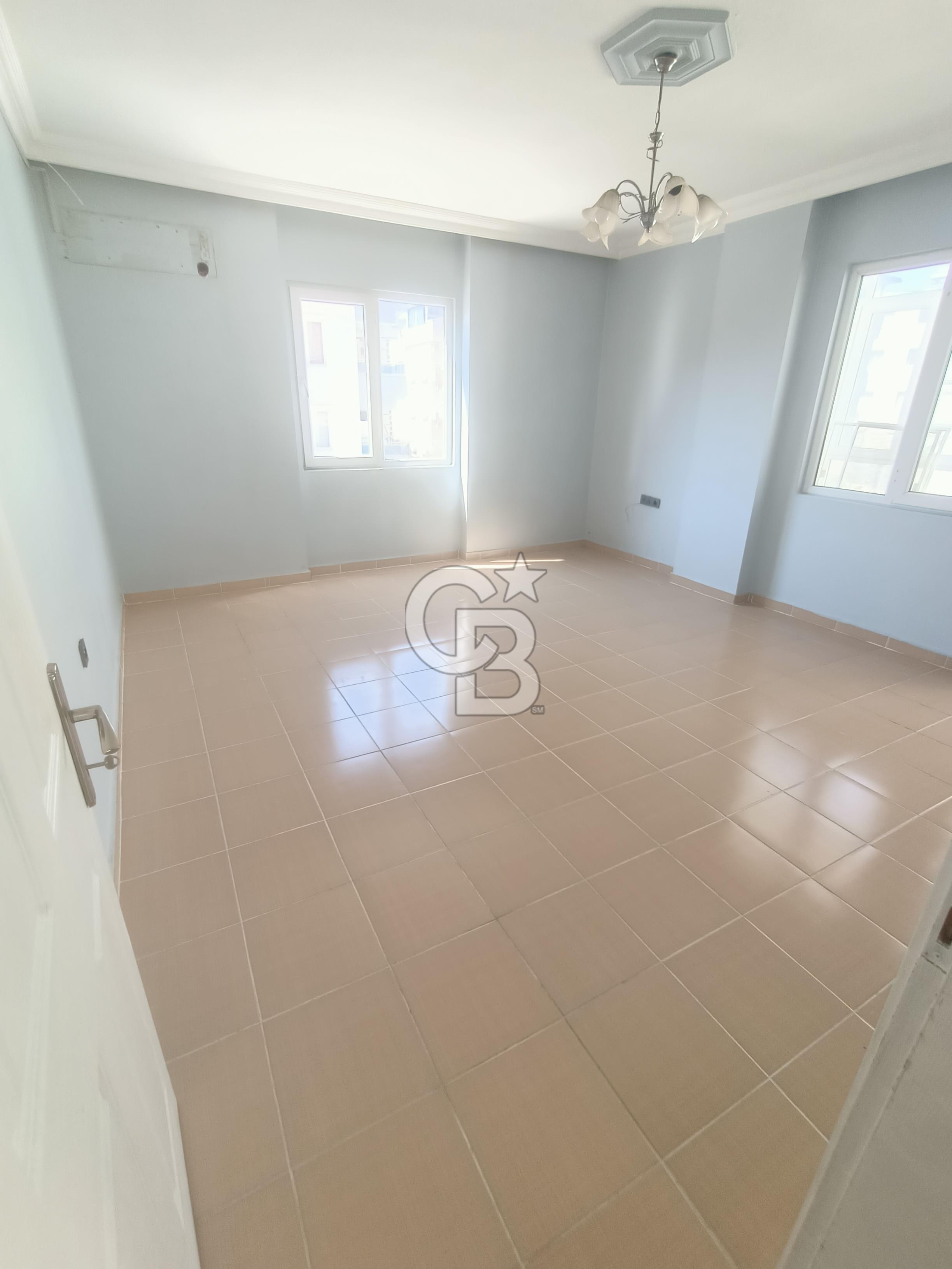 Didim merkez  de satılık 2+1 ayrı mutfak köşe başı ön cephe daire