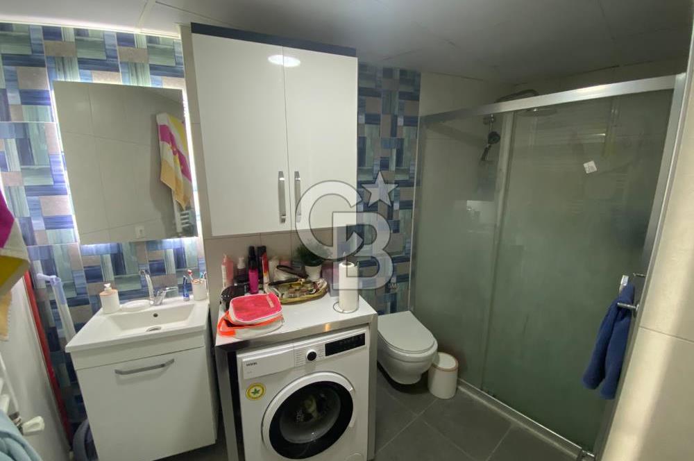 KARŞIYAKA TOSKANA EVLERİNDE SATILIK GENİŞ FERAH EŞYALI 1+1 DAİRE
