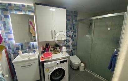 KARŞIYAKA TOSKANA EVLERİNDE SATILIK GENİŞ FERAH EŞYALI 1+1 DAİRE