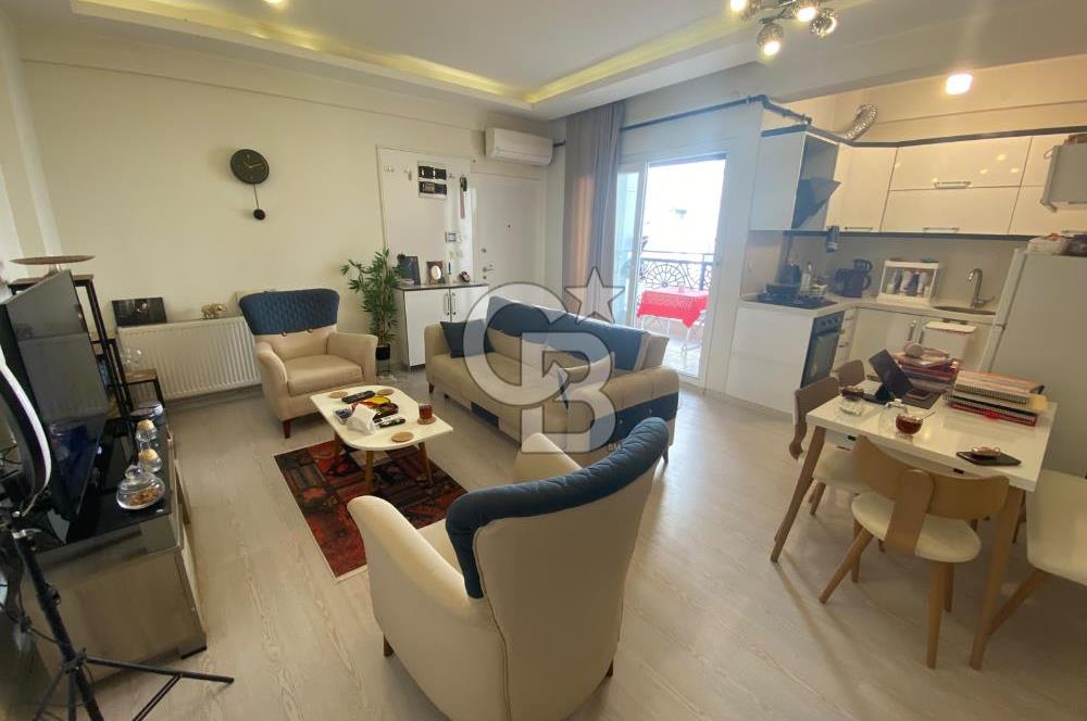 KARŞIYAKA TOSKANA EVLERİNDE SATILIK GENİŞ FERAH EŞYALI 1+1 DAİRE
