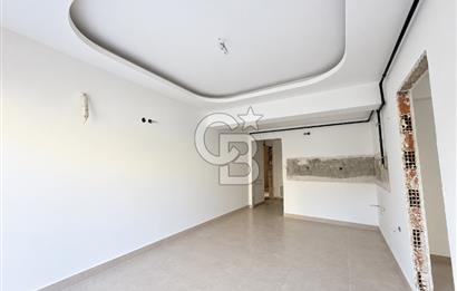 KARŞIYAKA MAVİŞEHİR YALI MAHALLESİNDE BAHÇELİ 1+1  SATILIK DAİRE