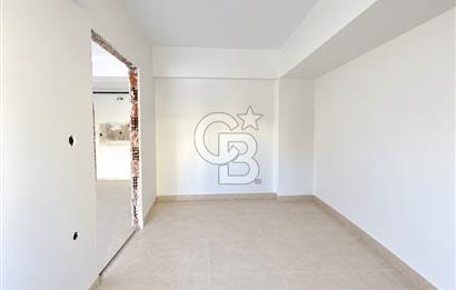 KARŞIYAKA MAVİŞEHİR YALI MAHALLESİNDE BAHÇELİ 1+1  SATILIK DAİRE