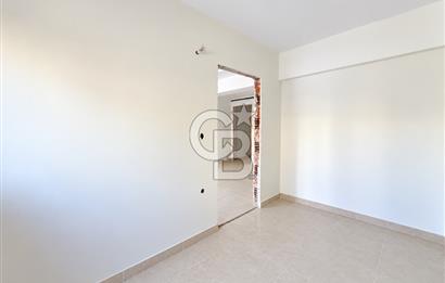 KARŞIYAKA MAVİŞEHİR YALI MAHALLESİNDE BAHÇELİ 1+1  SATILIK DAİRE
