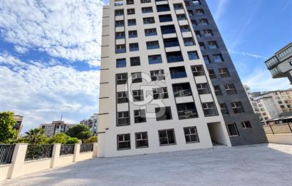 KARŞIYAKA MAVİŞEHİR YALI MAHALLESİNDE BAHÇELİ 1+1  SATILIK DAİRE