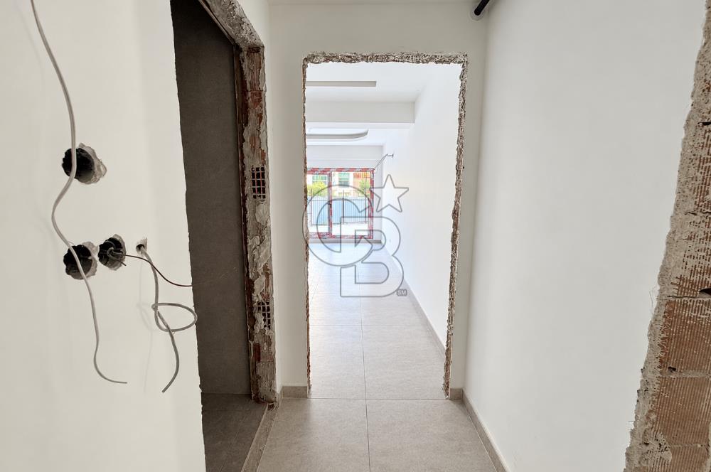 KARŞIYAKA MAVİŞEHİR YALI MAHALLESİNDE BAHÇELİ 1+1  SATILIK DAİRE