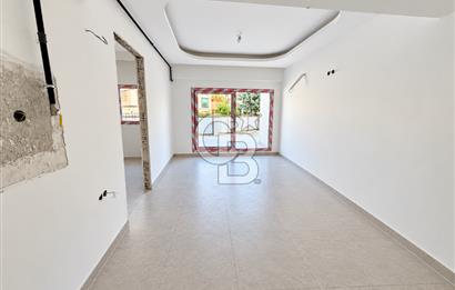 KARŞIYAKA MAVİŞEHİR YALI MAHALLESİNDE BAHÇELİ 1+1  SATILIK DAİRE