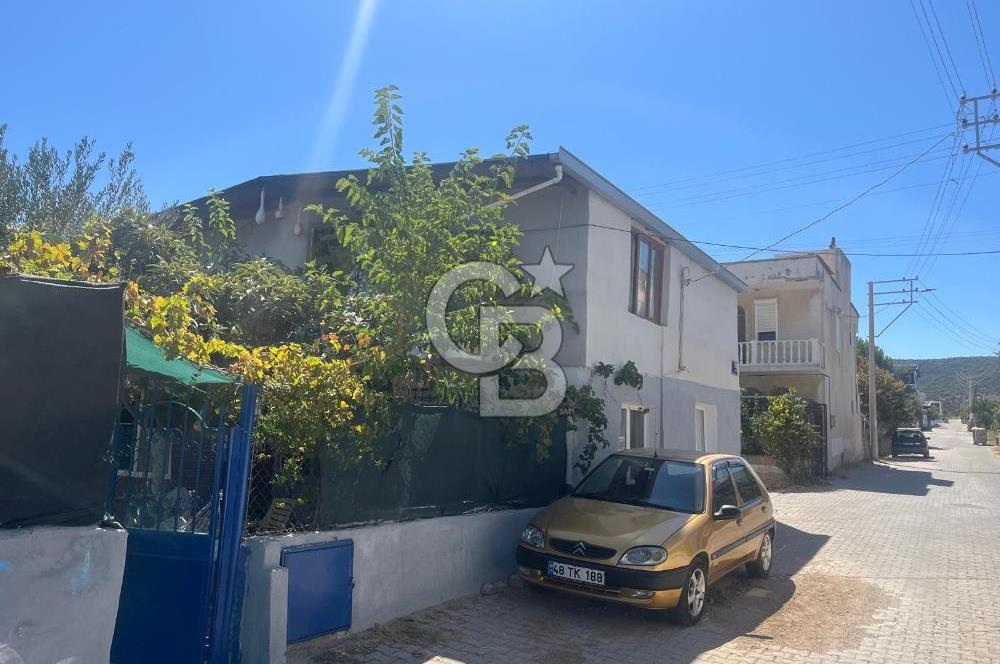 URLA GÜLBAHÇE'DE İÇERİSİNDE KAYITLI BİNA OLAN İMARLI ARSA