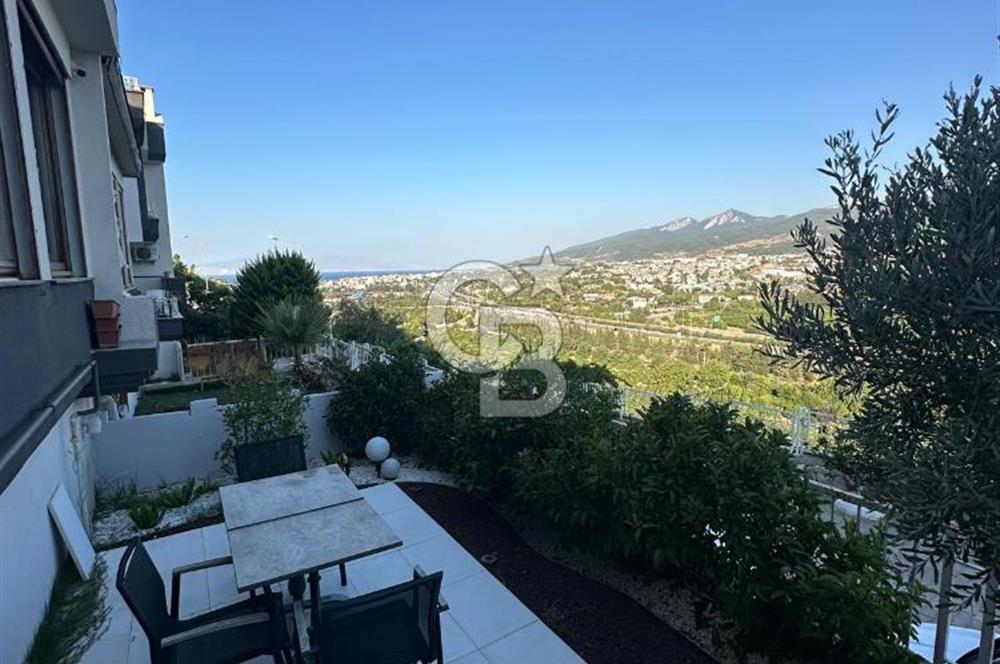 Güzelbahçe de Güvenlikli Site İçerisinde Deniz Manzaralı Villa