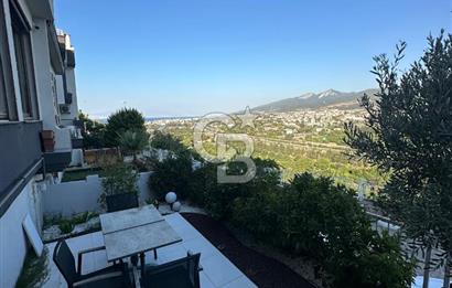 Güzelbahçe de Güvenlikli Site İçerisinde Deniz Manzaralı Villa