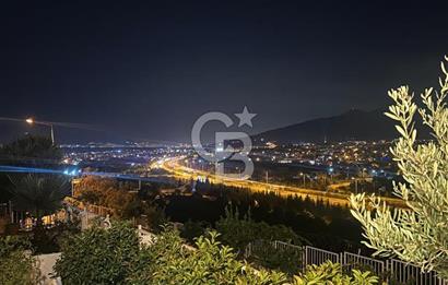 Güzelbahçe de Güvenlikli Site İçerisinde Deniz Manzaralı Villa