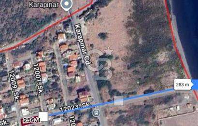 URLA GÜLBAHÇE'DE İÇERİSİNDE KAYITLI BİNA OLAN İMARLI ARSA