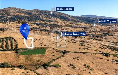 CB EAGLE'dan BURHANİYE YAYLACIK'DA 4.394m² İZMİR YOLU ÜZERİ TARLA