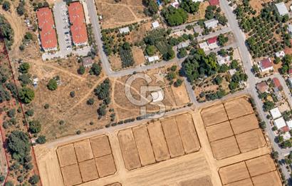 EZİNE MAHMUDİYE'DE %80 İMARLI 451 M² SATILIK ARSA