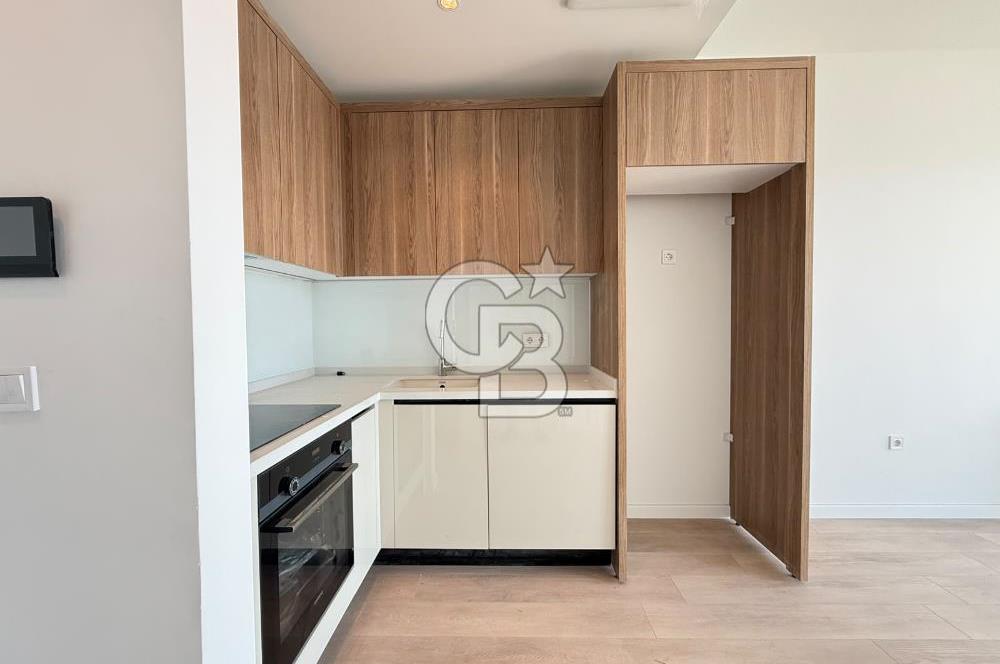 İnci Smyrna' da Deniz Manzaralı Satılık 1+1 Daire