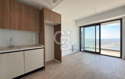 İnci Smyrna' da Deniz Manzaralı Satılık 1+1 Daire