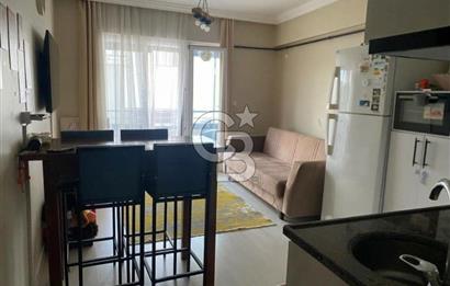LAPSEKİ CUMHURİYET MAH. CADDE ÜZERİ EŞYALI 1+1 SATILIK DAİRE