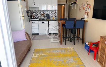 LAPSEKİ CUMHURİYET MAH. CADDE ÜZERİ EŞYALI 1+1 SATILIK DAİRE