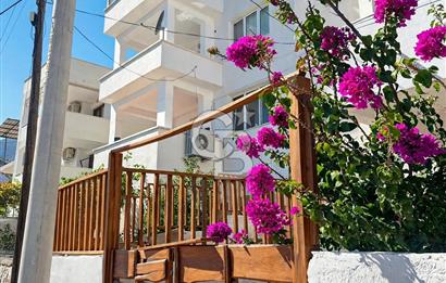   KARABURUN MERKEZDE PANORAMİK DENİZ MANZARALI, ÖZEL BAHÇELİ 2+1 DAİRE