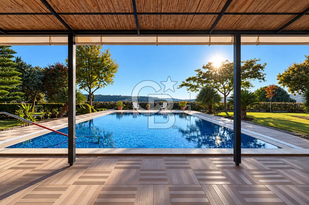 ÇEŞME FAHRETTİN PAŞA'DA 3.771 M² ARAZİDE, ÖZEL PEYZAJLI 6+1 VİLLA