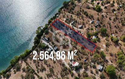 MUĞLA AKBÜK’TE SATILIK 2.564,96 m² DENİZE SIFIR | EŞSİZ KIYI KONUMU
