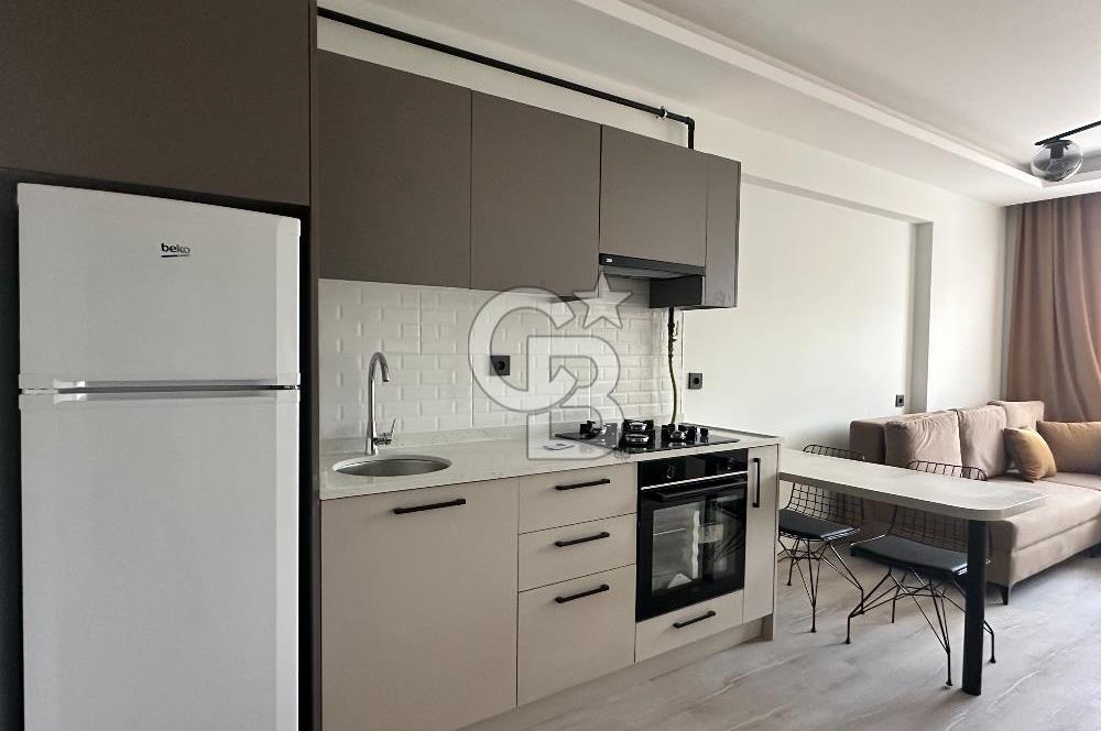 GÖRÜKLE MERKEZİ KONUMDA 1+1 EŞYALI SIFIR SATILIK DAİRE