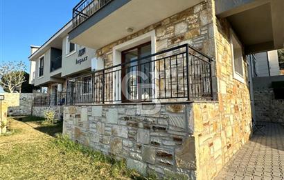 Foça Yenibağarası'nda Kiralık 2+1 Bahçe Katı Daire