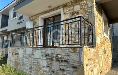 Foça Yenibağarası'nda Kiralık 2+1 Bahçe Katı Daire