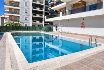 ÇİĞLİ HARMANDALI'NDA HAVUZLU SİTE İÇERİSİNDE FERAH VE KULLANIŞLI 2+1 DAİRE - 1 - 377941
