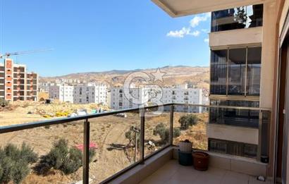 ÇİĞLİ HARMANDALI'NDA HAVUZLU SİTE İÇERİSİNDE FERAH VE KULLANIŞLI 2+1 DAİRE