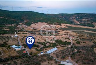 Foça Kocamehmetler'de Müstakil Tapulu Yola Cepheli Satılık Tarla - 1 - 377999