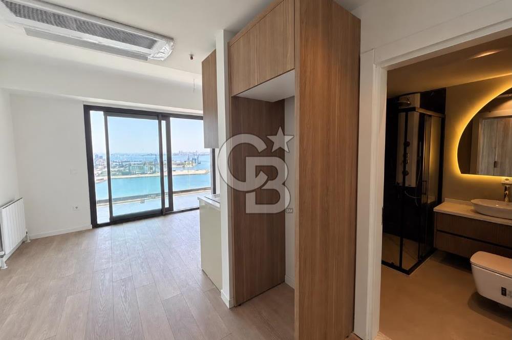 İnci Smyrna' da Büyük Tip Deniz Manzaralı Satılık 1+1 Daire