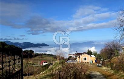 TURGUTALPTE DOĞAYLA İÇ İÇE, EŞSİZ MANZARALI, EVLİ SATILIK TARLA
