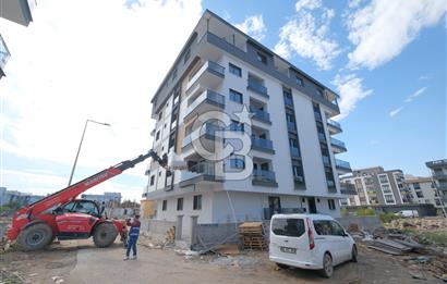 SEYREK’TE YÜKSEK KREDİ İMKANLI SATILIK GENİŞ SIFIR BALKONLU 1+1 DAİRE