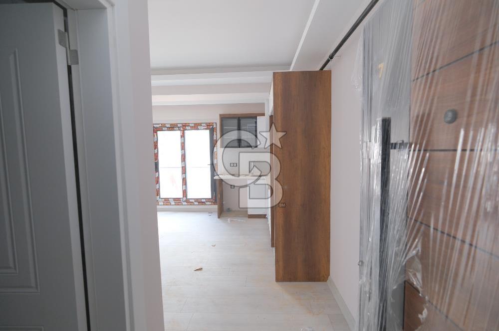 SEYREK’TE YÜKSEK KREDİ İMKANLI SATILIK GENİŞ SIFIR BALKONLU 1+1 DAİRE