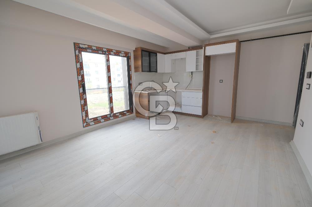 SEYREK’TE YÜKSEK KREDİ İMKANLI SATILIK GENİŞ SIFIR BALKONLU 1+1 DAİRE