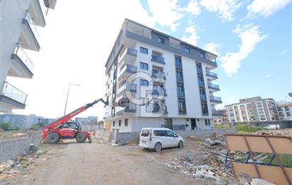 SEYREK’TE YÜKSEK KREDİ İMKANLI SATILIK GENİŞ SIFIR BALKONLU 1+1 DAİRE