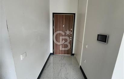 ORTAKENT MERKEZDE LÜKS SİTEDE EŞYASIZ BAHÇELİ 2+1 GENİŞ DAİRE
