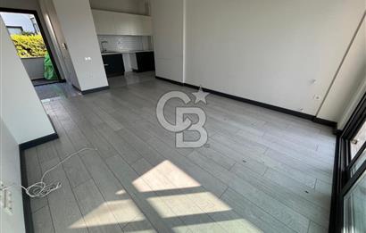 ORTAKENT MERKEZDE LÜKS SİTEDE EŞYASIZ BAHÇELİ 2+1 GENİŞ DAİRE