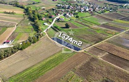 CB AKADEMİ ÇAVUŞLU SATILIK ÇİFT CEPHE YOLA SAHİP 1374 m2 TARLA