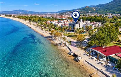 Kuşadası Güzelçamlı'da Denize Sıfır 32 Odalı, Full Deniz Manzaralı Satılık Otel