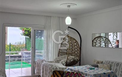BODRUM GÜNDOĞAN PLAJLI SİTEDE DENİZ MANZARALI  KİRA GETİRİLİ 4 KATLI SATILIK VİLLA