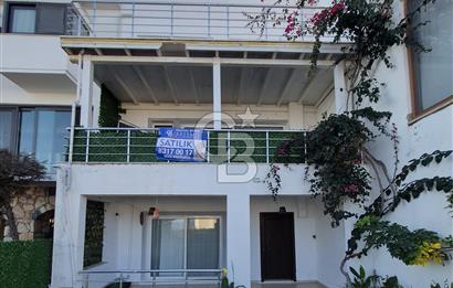 BODRUM GÜNDOĞAN PLAJLI SİTEDE DENİZ MANZARALI  KİRA GETİRİLİ 4 KATLI SATILIK VİLLA