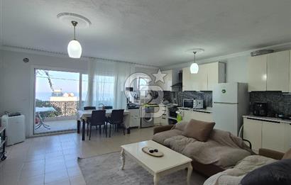 BODRUM GÜNDOĞAN PLAJLI SİTEDE DENİZ MANZARALI  KİRA GETİRİLİ 4 KATLI SATILIK VİLLA